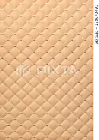 Intricate quilted texture showcasing warmth and softness in home decor Intricate quilted texture showcasing warmth and softness in home decor 120643491
