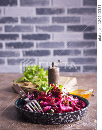 Vinegret- traditional Russian beet salad and vegetables on plate Vinegret- traditional Russian beet salad and vegetables on plate 120643581