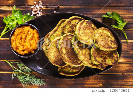 Rustic Autumn Meal Pancakes from Zucchini. Vegetarian Diets. 120643691