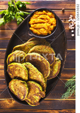 Rustic Autumn Meal Pancakes from Zucchini. Vegetarian Diets. 120643692