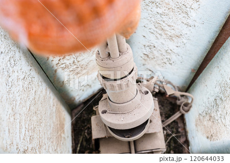 replacing old halogen lamp inside street light replacing old halogen lamp inside street light 120644033