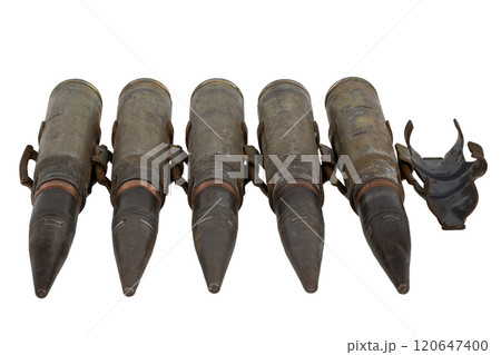 Ammunition belt with 30 mm armor piecing rounds for automatic canon 2A42 from infantry fighting vehicle BMP-2 used by the former Soviet Union. Isolated on white. Ammunition belt with 30 mm armor piecing rounds for automatic canon 2A42 from infantry fighting vehicle BMP-2 used by the former Soviet Union. Isolated on white. 120647400