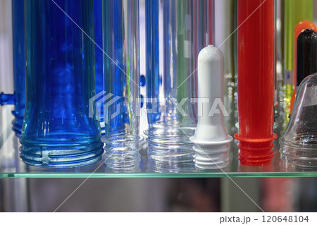 Close up scene of group of preform shape of PET bottle products. Close up scene of group of preform shape of PET bottle products. 120648104