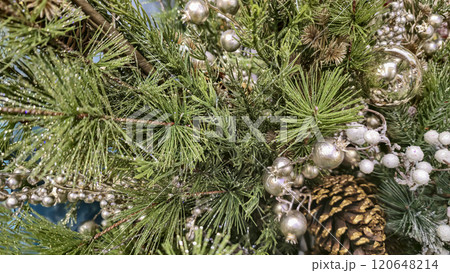 Decorated Christmas tree with festive toys Christmas atmosphere. 120648214