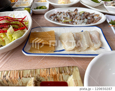 Korean food. Skate sashimi and white kimchi Korean food. Skate sashimi and white kimchi 120650287