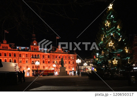 Festive Christmas Tree and Illuminated Building in Sundsvall, Sweden Festive Christmas Tree and Illuminated Building in Sundsvall, Sweden 120650317