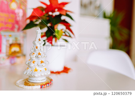 christmas decor candlestick tree flower christmas star on table in room christmas decor candlestick tree flower christmas star on table in room 120650379