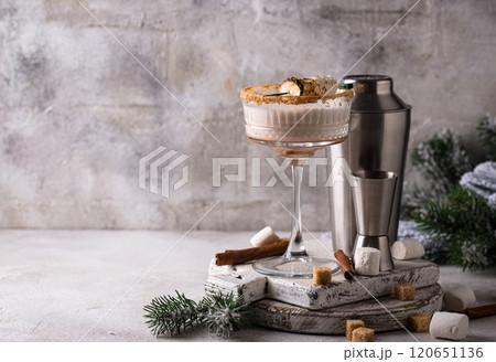 Christmas cocktail with toasted marshmellow Christmas cocktail with toasted marshmellow 120651136