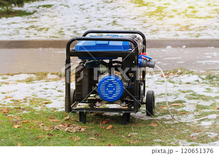 Problem with electricity. Portable gasoline or diesel generator to provide electricity. Mobile device. Winter. 120651376