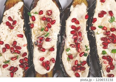 fried eggplant with sauce, decorated with microgreens and pomegranate seeds, eggplant appetizer, top view, homemade, no people, fried eggplant with sauce, decorated with microgreens and pomegranate seeds, eggplant appetizer, top view, homemade, no people, 120653138