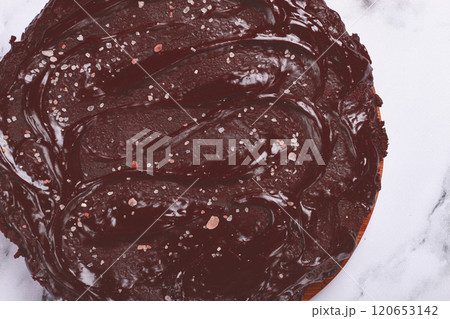 chocolate cake, round cake, on a marble light table, top view, homemade cakes, no people, 120653142