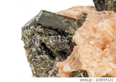 Macro of a mineral stone Vesuvianite on a white background Macro of a mineral stone Vesuvianite on a white background 120654121