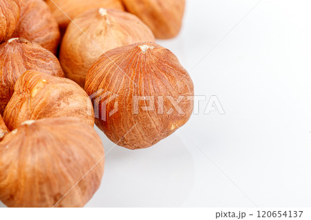 macro hazelnuts nuts on a white background 120654137