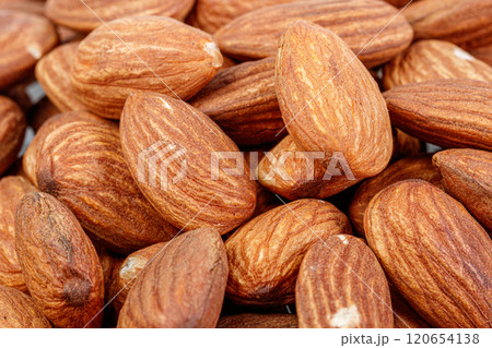 macro almond nuts on a white background macro almond nuts on a white background 120654138