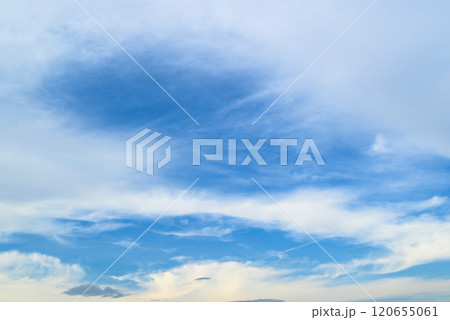 White clouds in a bright blue sky. The beauty of the nature White clouds in a bright blue sky. The beauty of the nature 120655061