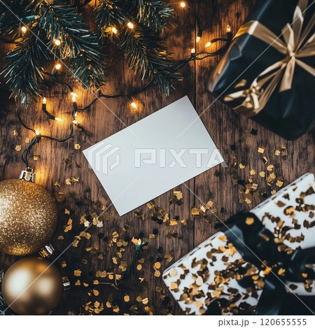A white card lies on a wooden table with Christmas presents. Blank white Christmas holiday postcard mockup A white card lies on a wooden table with Christmas presents. Blank white Christmas holiday postcard mockup 120655555