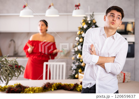Quarrel of wife and husband during christmas celebration 120659637