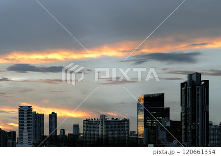 Silhouette view of Modern high-rise buildings and background of Dramatic sky in the city of Bangkok. 120661354
