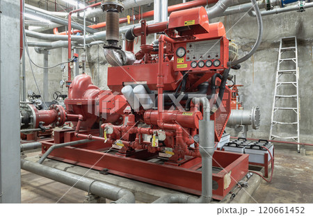 Fire protection system of Condominium. Red generator pump for water sprinkler piping and Fire alarm control system. Fire protection system of Condominium. Red generator pump for water sprinkler piping and Fire alarm control system. 120661452