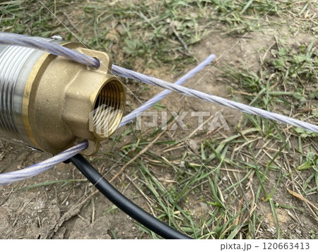Submersible borehole pump used for groundwater extraction Submersible borehole pump used for groundwater extraction 120663413