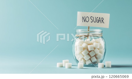 Glass jar filled with sugar cubes displays a no sugar sign, promoting sugar reduction and a low sugar lifestyle for improved well being Glass jar filled with sugar cubes displays a no sugar sign, promoting sugar reduction and a low sugar lifestyle for improved well being 120665069