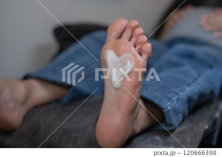 Pregnant woman on a hardware pedicure procedure in a beauty salon. Pregnant woman on a hardware pedicure procedure in a beauty salon. 120666398