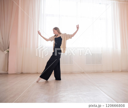 Caucasian woman dancing contemporary in ballet class. Rehearsal. 120666808