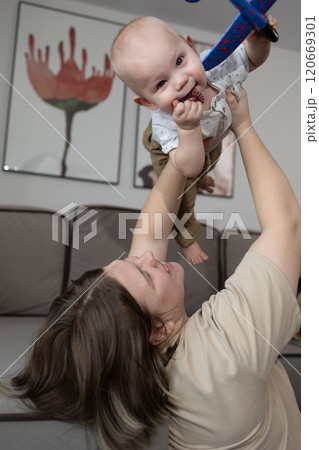 Joyful Playtime Parent and Baby Share Heartwarming Moments Full of Laughter and Fun Joyful Playtime Parent and Baby Share Heartwarming Moments Full of Laughter and Fun 120669301