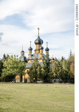 Landscape with Orthodox Christian church in traditional style. Wooden Orthodox church 120669965