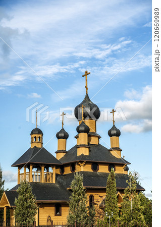 Landscape with Orthodox Christian church in traditional style. Wooden Orthodox church 120669989