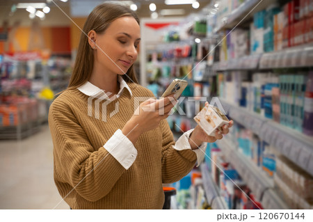 Shopping for personal care products in a bright retail store with diverse options available 120670144