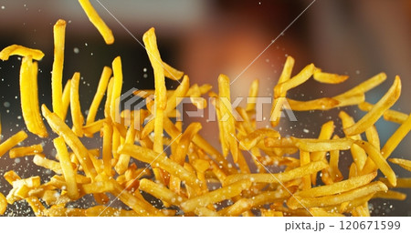 French Fries, Fried Potatoes Flying up in the Air. 120671599