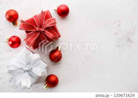 Red and white gift boxes on white marble background. Christmas New year concept. Selective focus. 120671629