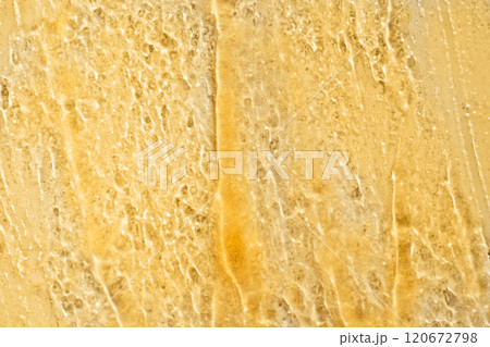Gold gel rectangle smear closeup on white background 120672798