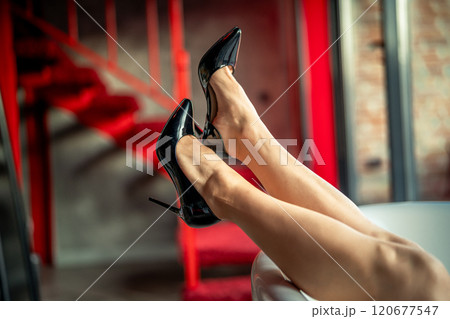Woman feet high heels shoes in bathrobe at home, closeup Woman feet high heels shoes in bathrobe at home, closeup 120677547
