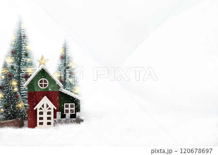 Decorative Christmas house with Christmas trees and snowy , copy space for text 120678697