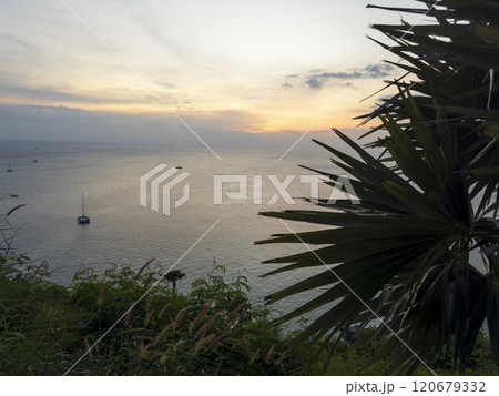 Promthep cape viewpoint at sunset in Phuket, Thailand. Promthep cape viewpoint at sunset in Phuket, Thailand. 120679332
