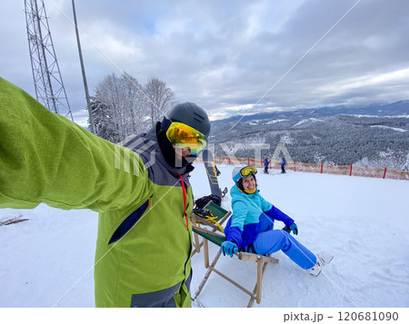 Skiing Selfie on Snowy Mountain Slope 120681090