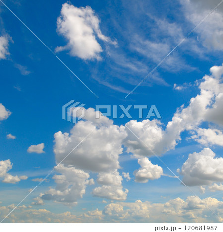 Blue sky with light, cumulus clouds. 120681987