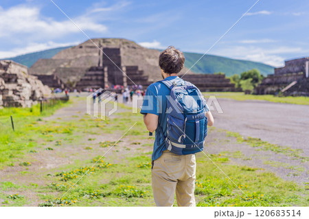 Male tourist exploring Teotihuacan, Mexico. Cultural heritage, ancient ruins, and archaeological adventure concept Male tourist exploring Teotihuacan, Mexico. Cultural heritage, ancient ruins, and archaeological adventure concept 120683514