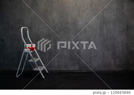 ladder with a gift in the interior of a room ladder with a gift in the interior of a room 120683698