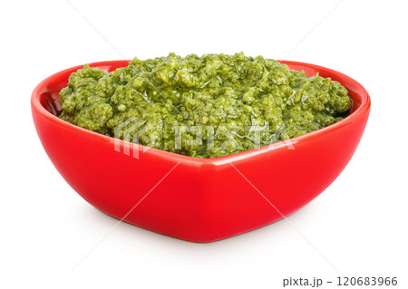 Pesto sauce in ceramic bowl isolated on white background Pesto sauce in ceramic bowl isolated on white background 120683966