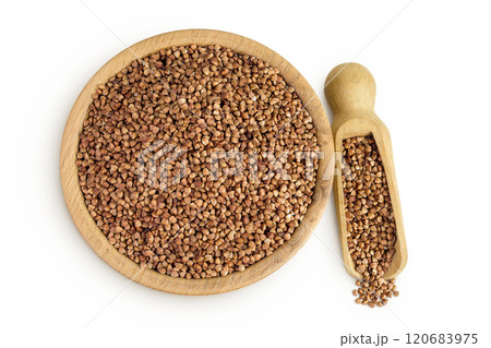 Raw buckwheat in wooden bowl isolated on white background. Top view. Flat lay 120683975