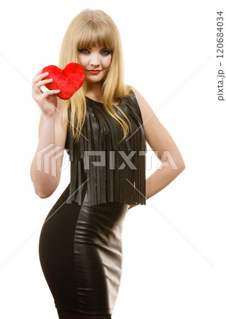Woman gorgeous girl holding red heart love symbol Woman gorgeous girl holding red heart love symbol 120684034