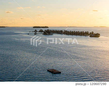 Aerial views of Velavaru Island at sunset in Maldives Aerial views of Velavaru Island at sunset in Maldives 120687290
