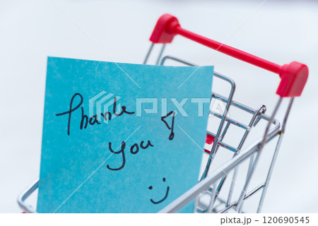 Business thank you note in shopping cart retail environment digital content close-up view gratitude concept 120690545