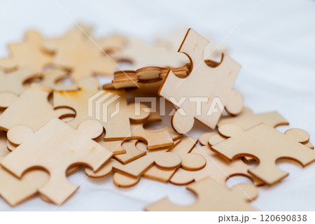 Creative business strategies puzzle assembly visual content indoor close-up problem-solving mindset Creative business strategies puzzle assembly visual content indoor close-up problem-solving mindset 120690838
