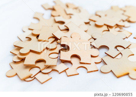 Puzzle pieces representing business strategy planning creative workspace digital content calm environment aerial view conceptual thinking Puzzle pieces representing business strategy planning creative workspace digital content calm environment aerial view conceptual thinking 120690855