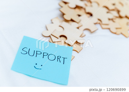 Business support puzzle pieces office desk digital note organized environment close-up view teamwork concept Business support puzzle pieces office desk digital note organized environment close-up view teamwork concept 120690899