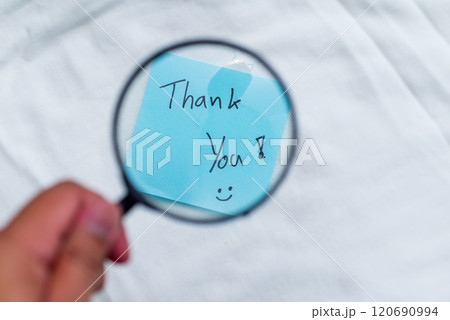 Business appreciation event thank you note office desk note taking professional environment close-up view gratitude concept Business appreciation event thank you note office desk note taking professional environment close-up view gratitude concept 120690994